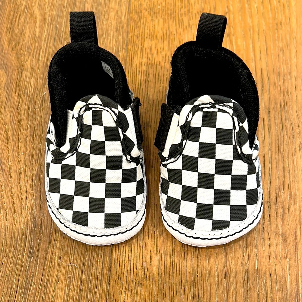 Classic black and white slip on vans crib shoes